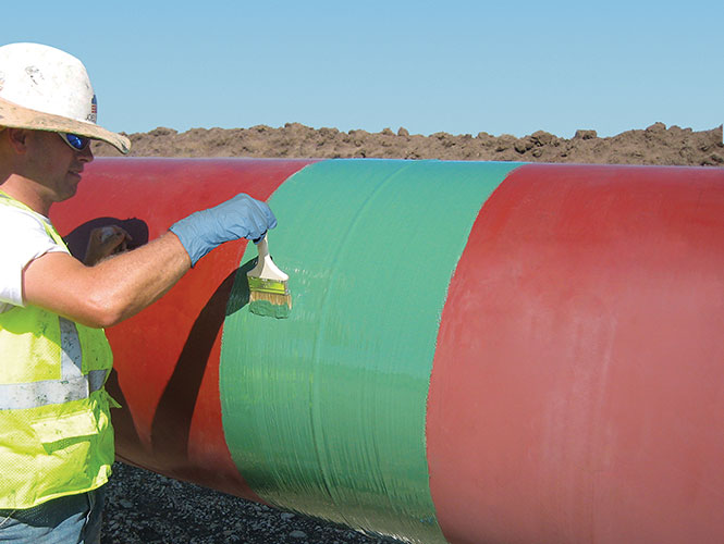 Protal 7200 being brush applied to a pipe section