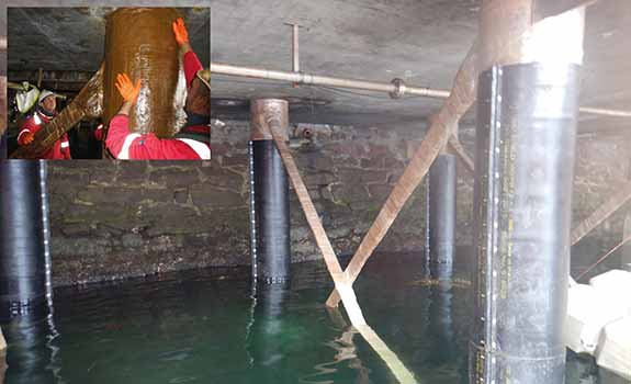 Denso SeaShield corrosion prevention systems applied to the jetty piles and crossbeams at Ullapool Harbour