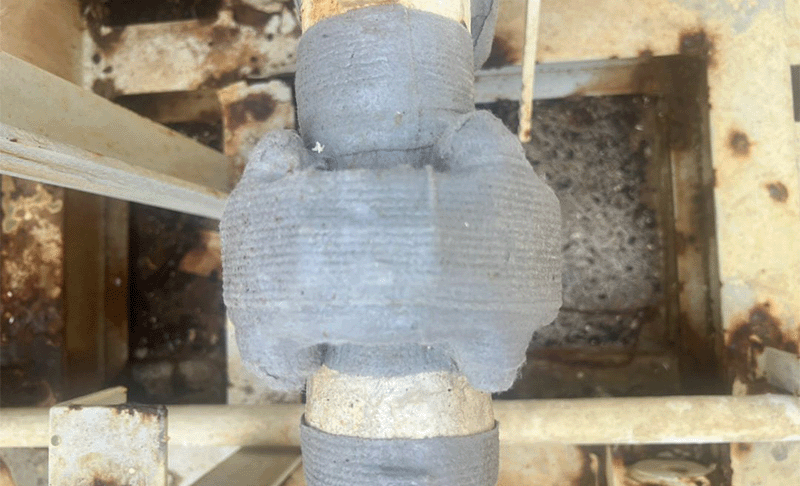 Flanges wrapped with a grey tape (ColourTape) in a trial of the tape's effectiveness.