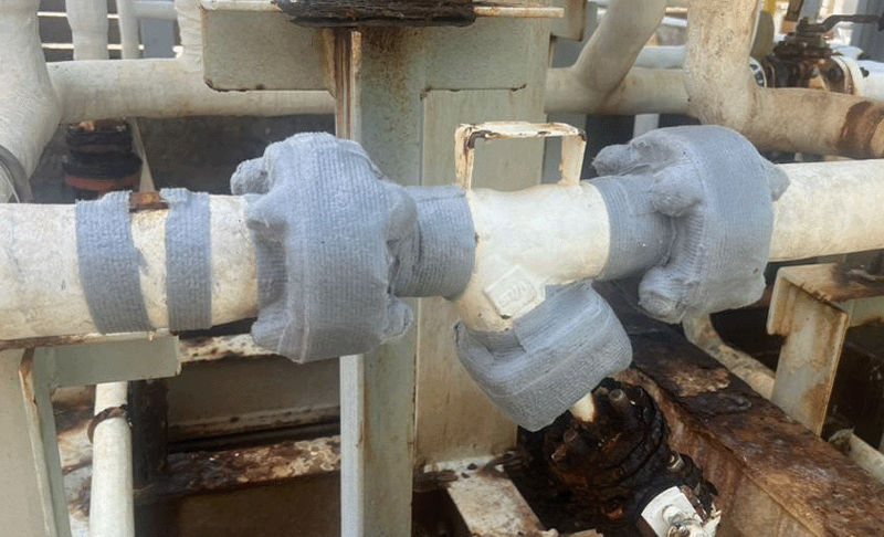 Flanges wrapped with a grey tape (ColourTape) as seen one month later.