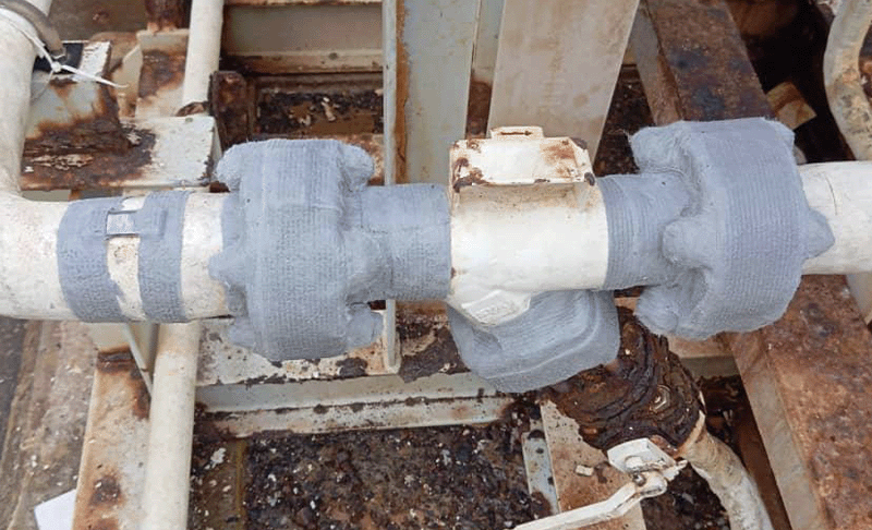 Flanges wrapped with a grey tape (ColourTape) in a trial of the tape's effectiveness.