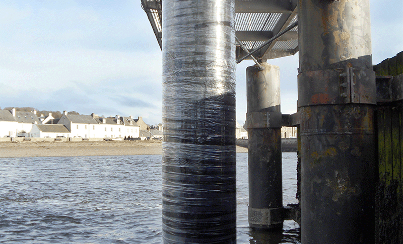 A jetty pile wrapped in a clear wrap.